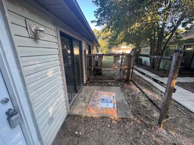 Building Photo - 6823 Tiki Ln