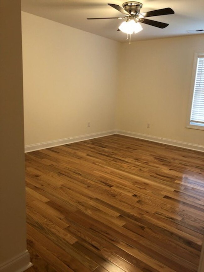 Building Photo - Pristine Duplex with Hardwood Floors and M...