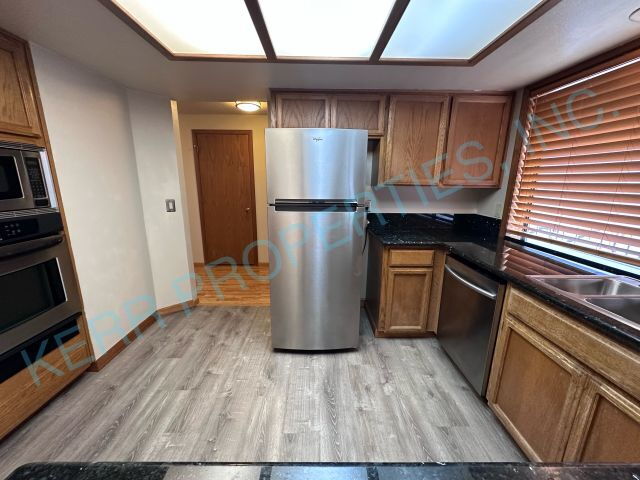 Building Photo - Charming 2-Bedroom / 2-Full Bathroom Condo Retreat in Happy Valley – Cozy Living Awaits!