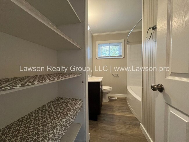 Building Photo - Charming Brick Ranch with Beautifully Landscaped Yard and Attached Carport