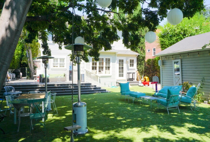 Backyard with main house pictured, your guest house on the right hand side - 2026 N Oxford Ave
