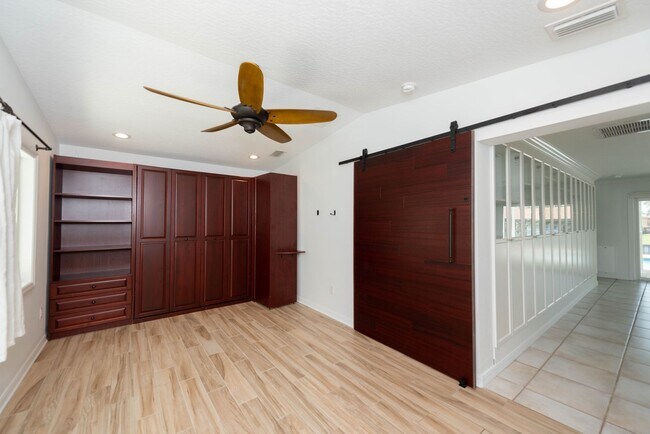 Building Photo - Live the ultimate Space Coast waterfront lifestyle at this stunning beachside canal home in Satel...