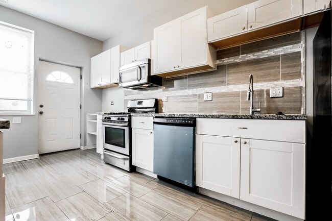 Building Photo - Spacious 4 Bedroom for Rent!