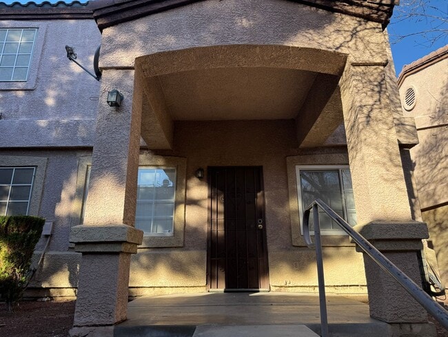 Primary Photo - Townhome featuring stylish layout in gated...
