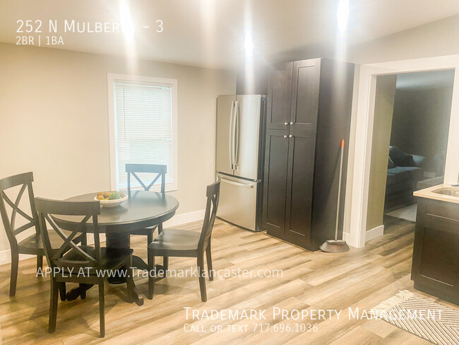 Building Photo - Spacious and Furnished 2 Bedroom West End ...