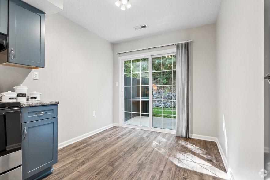 3BR, 2BA - 1,200SF - Dining Room - Brushwood Apartments