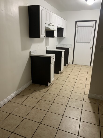 Kitchen tile floor - 14714 Strathern St