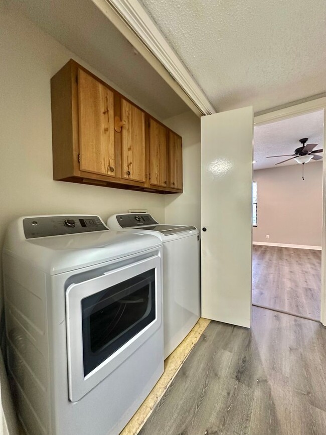 Building Photo - COMING MARCH 2026 - 2-Bedroom 2-Bathroom Condo + Clubhouse/Pool/River Access