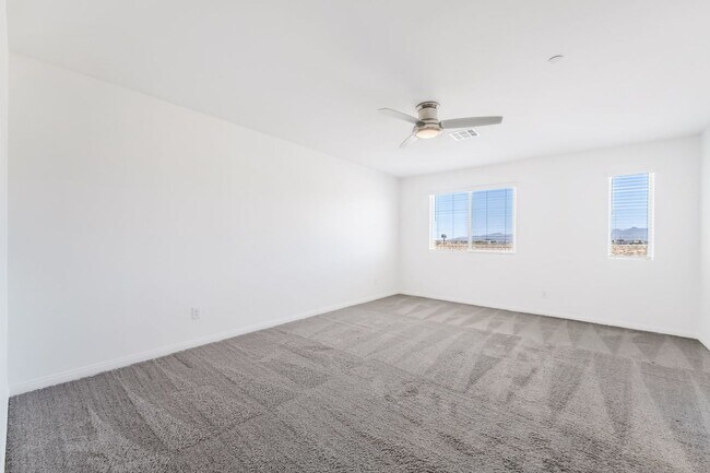 Building Photo - Modern Mosaic Townhome with Stylish Finishes & Resort-Style Community Amenities!