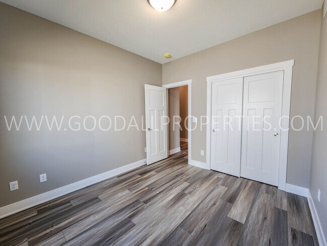 Building Photo - Spacious Waukee Ranch | 4 Bedrooms | 3-Car Garage | Finished Basement