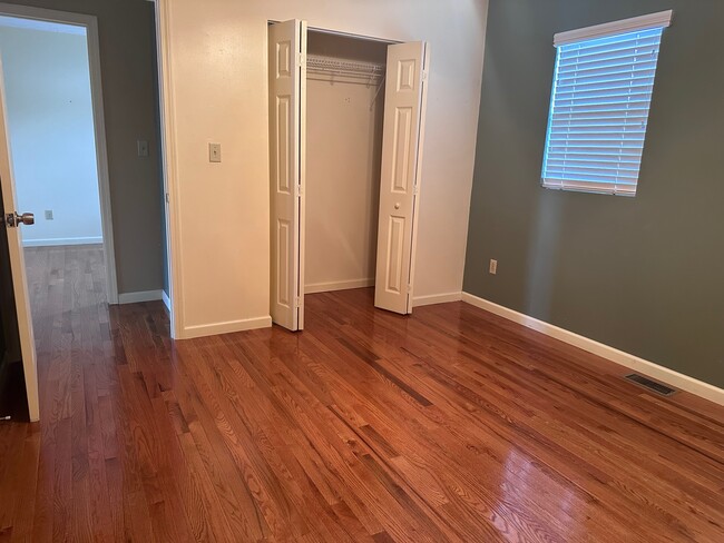 Bedroom, hardwood flooring throughout - 109 N Plains Rd