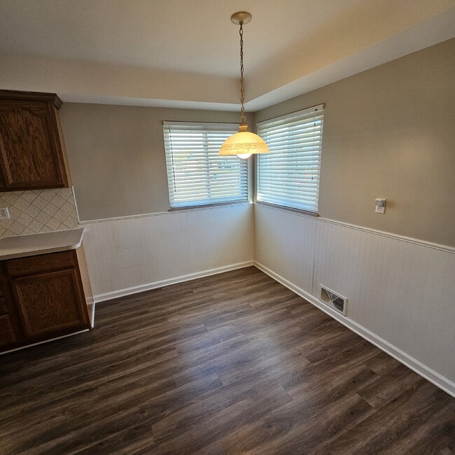 Building Photo - 3 Bedroom, 1.5 Bath Brick Ranch. Huge Great Room and Living Room. Big Kitchen, Backyard with Deck...