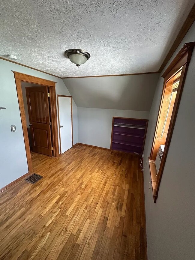 Building Photo - Ideally Located and Updated 4 Bed 2 Bath Fully-Fenced Home w/ Detached Garage/Shop!