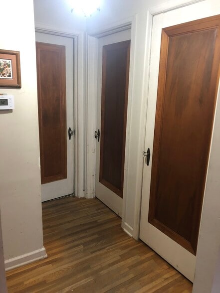 view of hallway, with Bathroom and 2nd Bedroom door, and upstairs storage doorstorage - 3536 N 47th Ave
