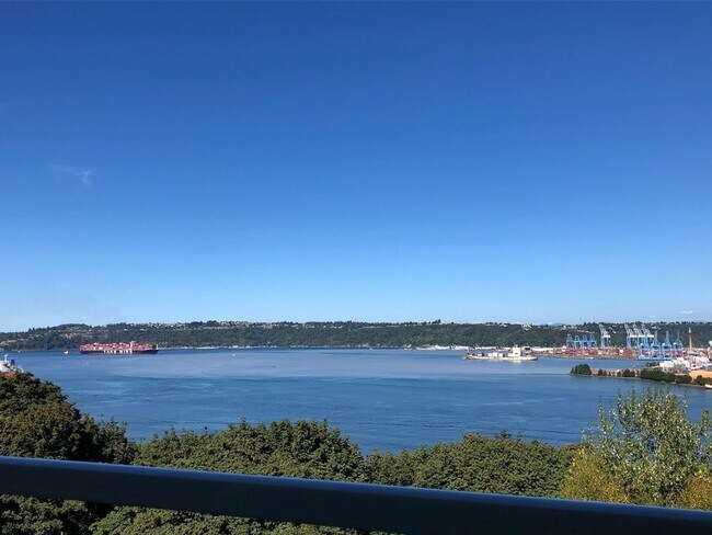 Building Photo - Sky Terrace 2 Bedroom 1.5 Bath Condo with ...
