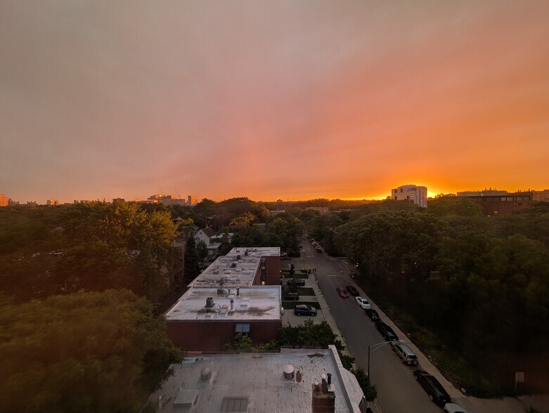 One of many beautiful sunsets captured out the living room window - 5400 S Harper Ave