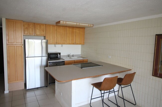 Building Photo - Live Just Steps from the Beach – 1BR at Mo...