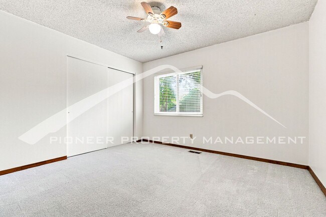 Building Photo - Spacious Home with Central AC and Traditional Wood Features