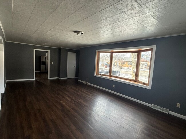 Building Photo - Check Out this Renovated House in a Quiet Neighborhood with a Large Yard!