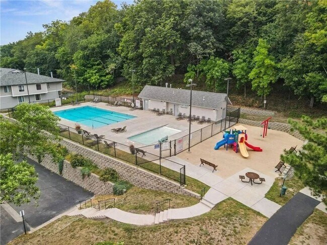 Building Photo - Spacious End-Unit Townhome with Fireplace, Family Room, 2-car Garage, Community Pool & Playground...