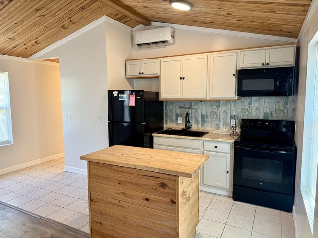 Building Photo - Cute newer home with large fenced yard!