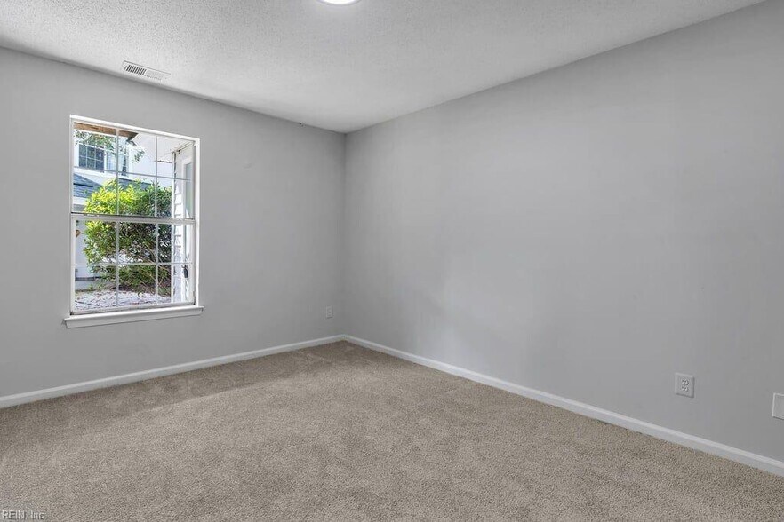 Second bedroom - 1st floor (has a standard closet and full bath) - 459 Seahorse Run