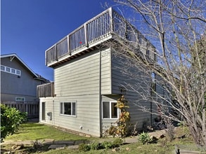 Building Photo - Live just steps from Seacliff State Beach in this unique coastal home and enjoy the ocean views f...