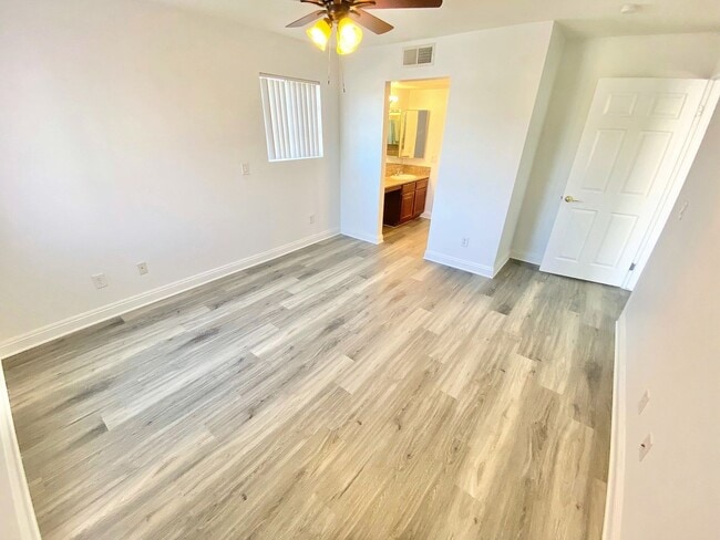 Building Photo - CONDOMINIUM IN A GATED COMMUNITY WITH 2 BE...