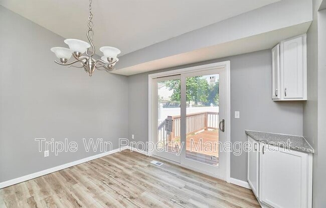 Building Photo - 4927 Triple Tree Ct