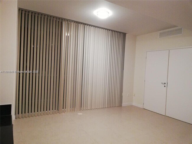 Building Photo - 300 S Biscayne Blvd