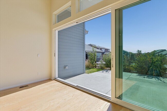 Building Photo - Modern 4-Bed Ranch in Erie with 13-Ft Ceilings, Solar Panels & EV Charger