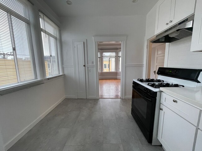 Building Photo - Charming 1BD with Multiple Bay Windows and...