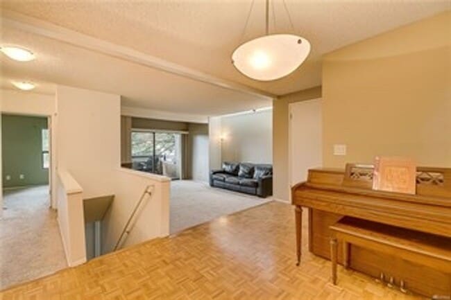 Building Photo - Freshly Updated 3BR Condo w/ Cozy Fireplace, Deck & 2 Parking