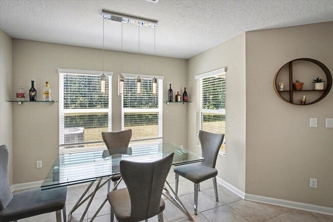 Building Photo - Beautiful Open Layout 4 Bed, 3 Full Bath | A True Masterpiece Backing to a Peaceful Pond with Mod...