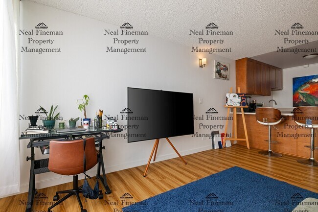 Building Photo - Unfurnished  1 Bed / 1 Bath Condo. 1 assigned covered parking stall. Rent Includes: AC Central, C...