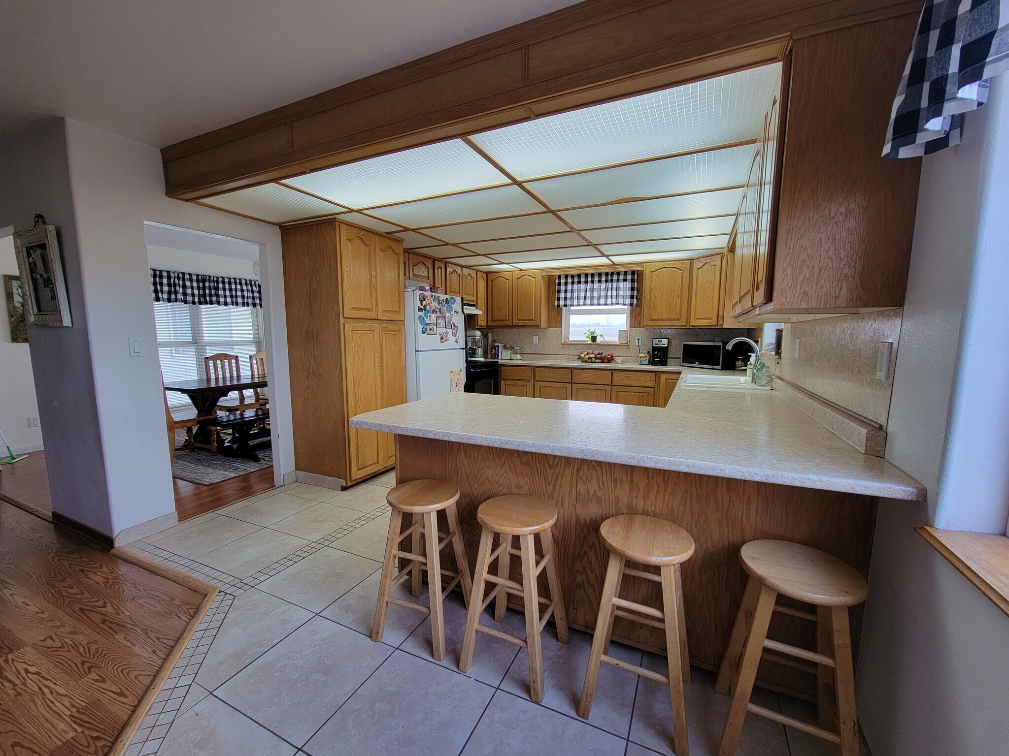 KITCHEN AND DINING AREA - 22310 Kimberly Rd