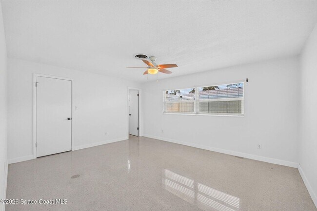 Building Photo - Welcome to this beautifully remodeled 4-bedroom, 3-bath home in the heart of Indialantic Beach!