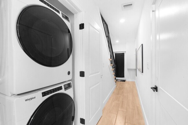Building Photo - Movie in special, first 1/2 month rent is FREE! Charming 2-Bedroom Condo with 2 Full & 2 Half Bat...