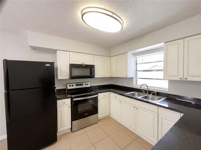 Building Photo - 8318 Chenille Dr