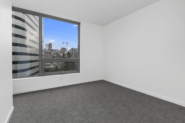 Building Photo - Nexus Condominium - 1 bedroom + den