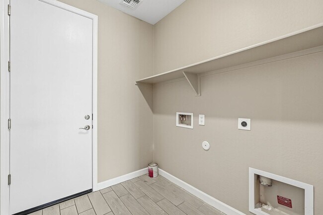 Building Photo - Spacious 5-Bedroom Home with Open Floor Plan & Private Backyard