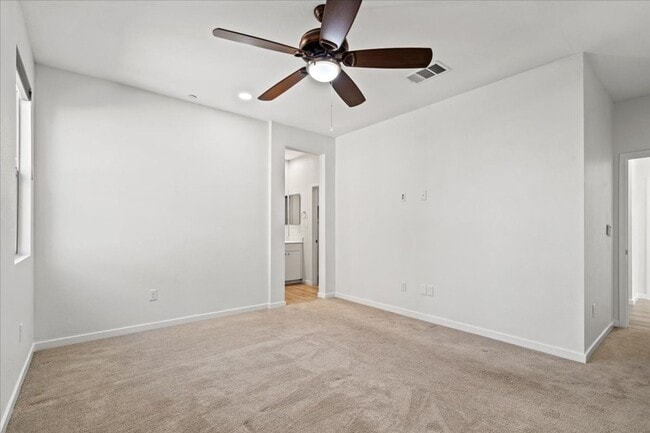 Building Photo - Resort-Style Living in a Modern 2 Bedroom Gated, 2 Pools, Home