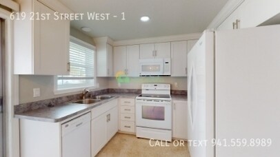 Building Photo - 619 21st St W