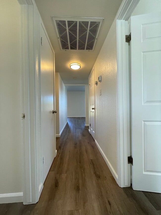 Building Photo - Centrally Located, Nicely Updated Throughout, Large Backyard, Attached Garage