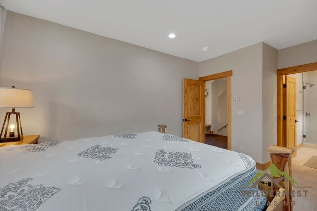 Building Photo - Beautiful Furnished Townhome with infared sauna, finished garage and community amenties