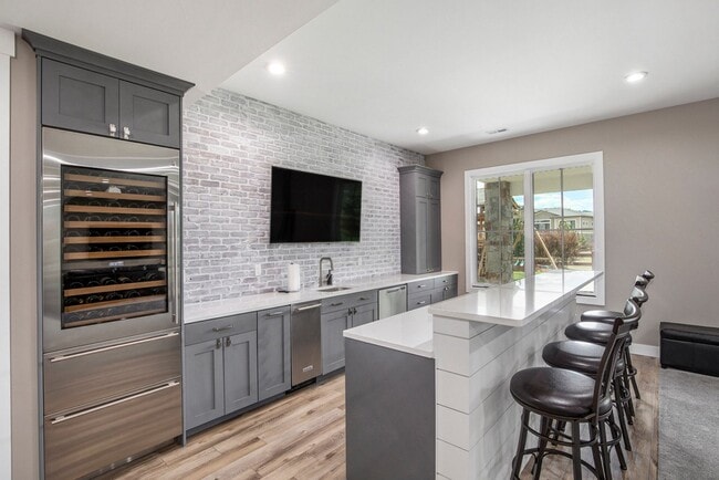 Building Photo - Stunning Custom Home in Harmony Club – Timnath, CO