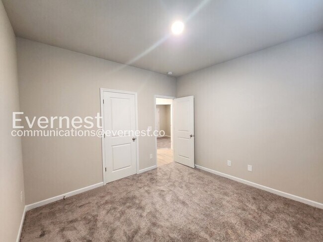 Building Photo - 4-Bedroom Home with Attached Garage / Pet-Friendly / Coming Soon!