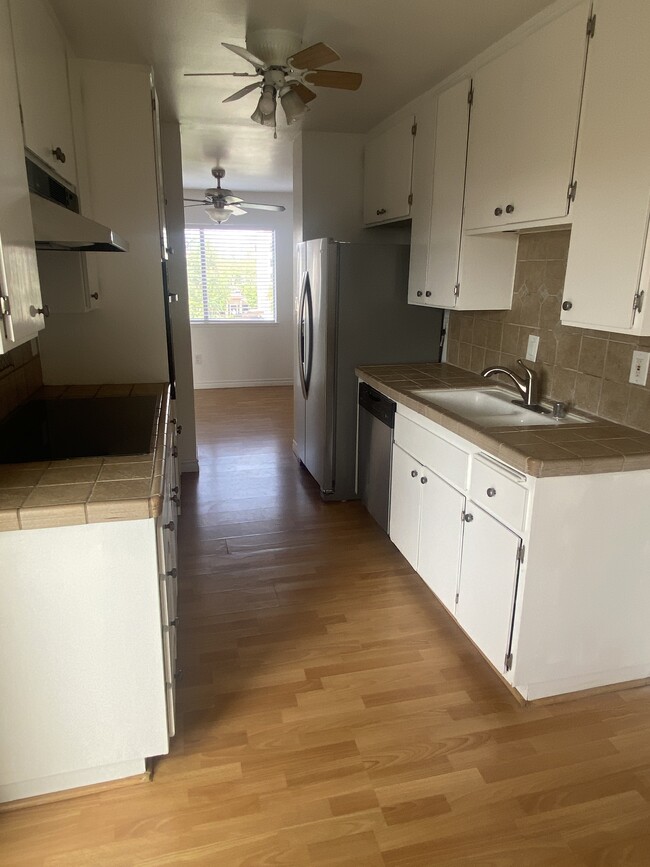 Kitchen with eat-in area leading to terrace. - 12200 Montecito Rd