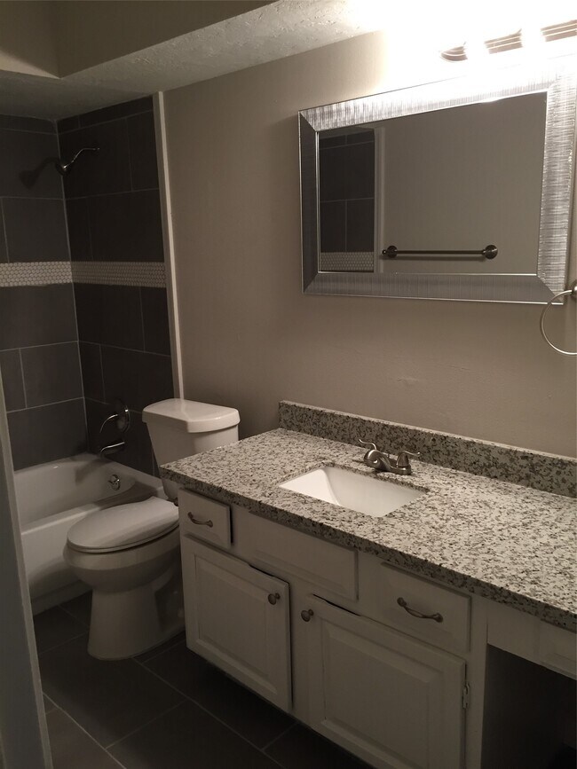 Building Photo - 5811 Woodmancote Dr