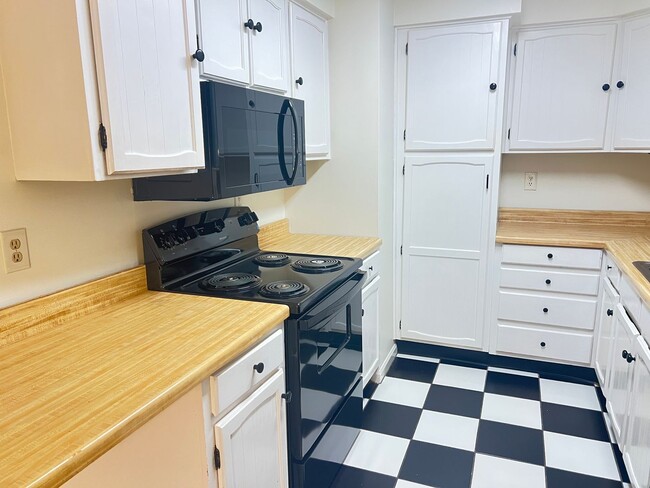 Building Photo - Walk to the Beach! Available Now! Unfurnished Two-Bedoom, First Floor Condo East of 17 in MB!